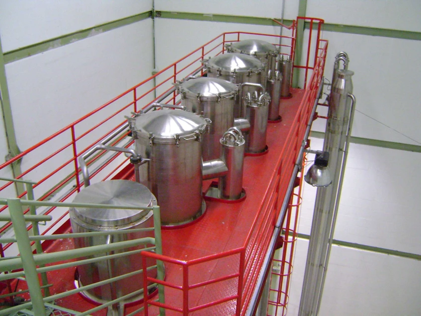 Falling Film evaporator cyclonic separators on elevated platform